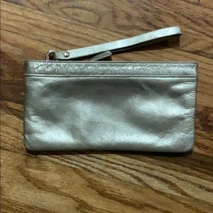 Kate Spade Chrissy gold metallic wristlet clutch